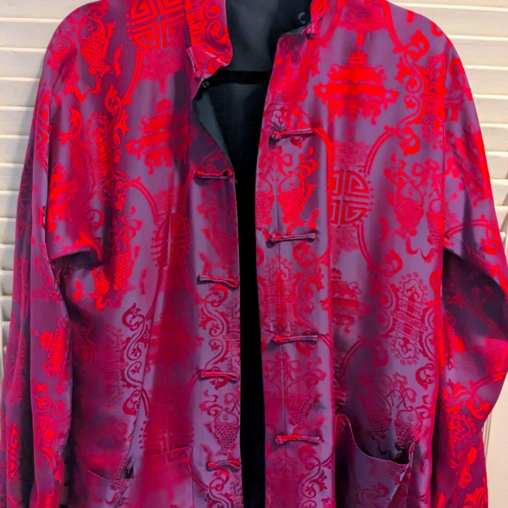 SOLD A vintage silk jacket in a vibrant pink